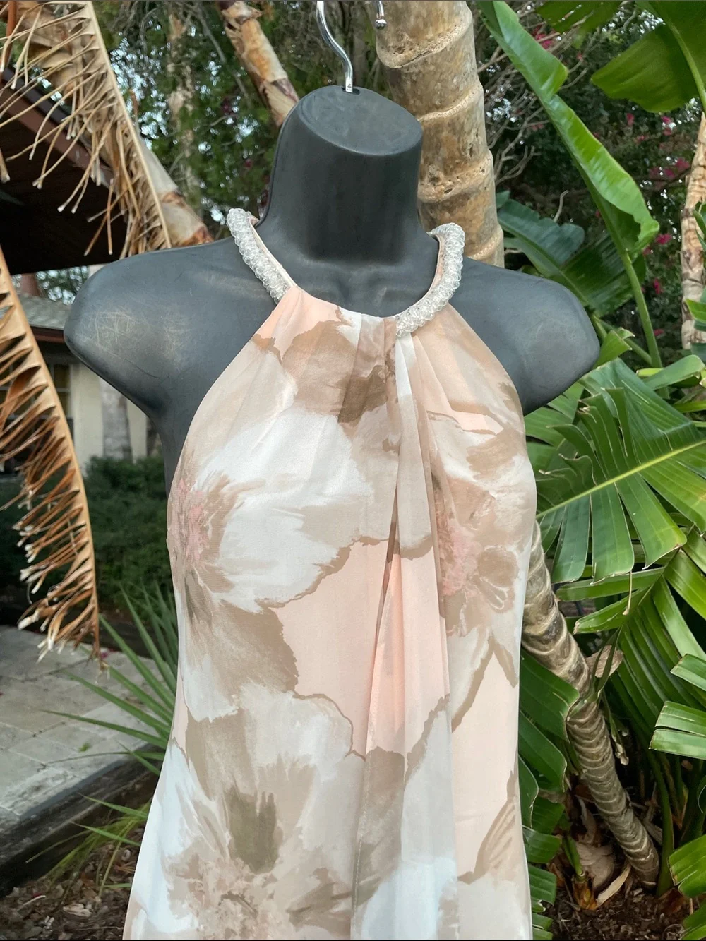 beaded collar, soft floral gretchen style gown by Calvin Klein
